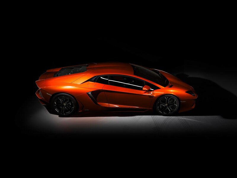Orange Sports Car — Dramatic, Photograph, Spotlight