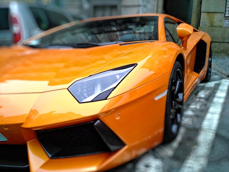Orange Sports Car — Dramatic, Photograph, Street