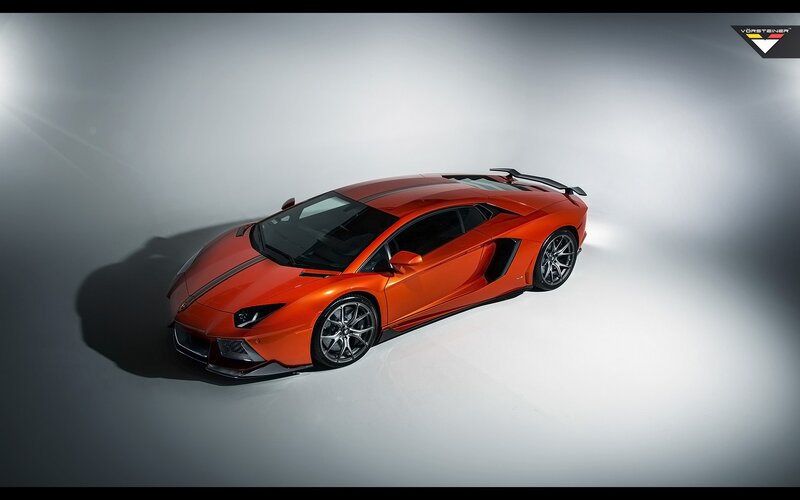 Orange Sports Car — Dramatic, Photograph, Studio Lighting