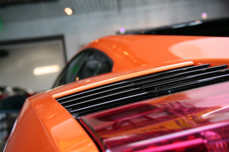 Orange Sports Car — Dramatic, Photograph, Taillight