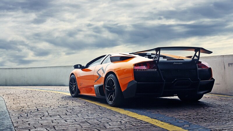 Orange Sports Car — Dramatic, Photograph, Tarmac