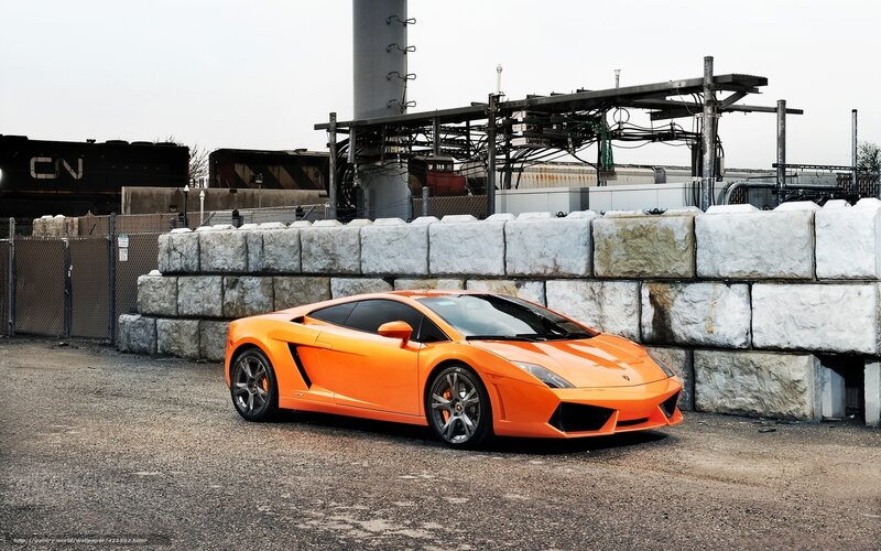 Orange Sports Car — Dramatic, Photograph, Train