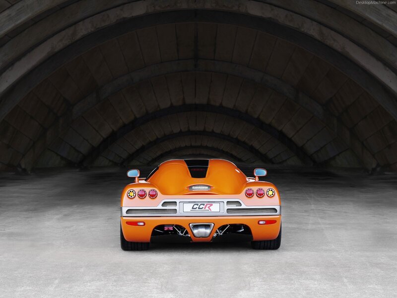 Orange Sports Car — Dramatic, Photograph, Tunnel, Exhaust