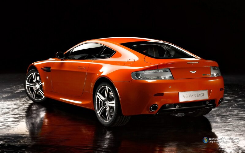 Orange Sports Car — Dramatic, Photograph, Wet Floor, License Plate