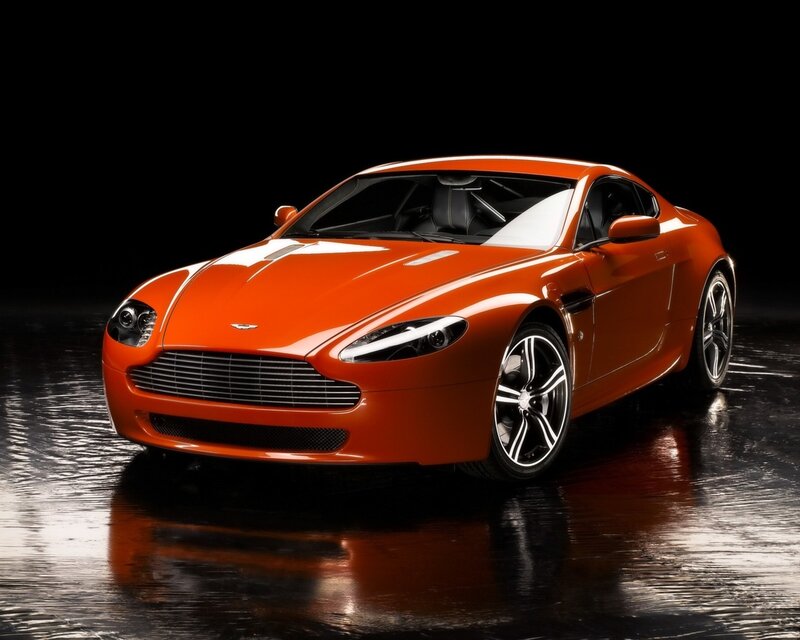 Orange Sports Car — Dramatic, Photograph, Wet Floor, Studio Lighting