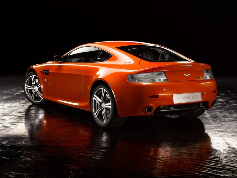 Orange Sports Car — Dramatic, Photograph, Wheel, License Plate, Black