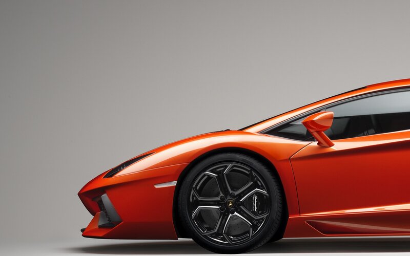 Orange Sports Car — Dramatic, Photograph, Wheel, Side Mirror, Window