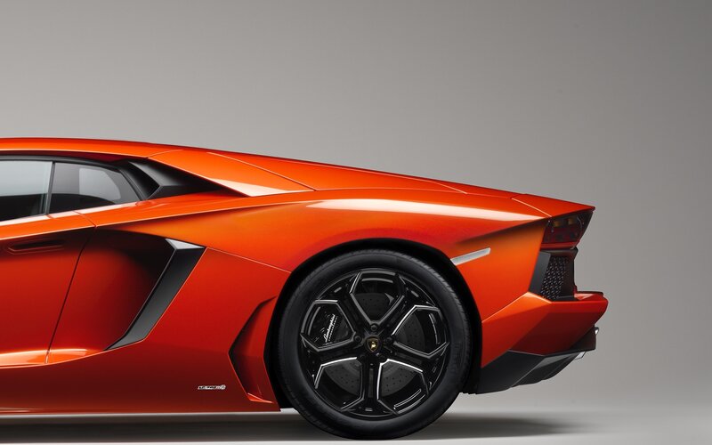Orange Sports Car — Dramatic, Photograph, Wheel, Taillight, Side Mirror, Black