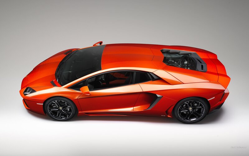 Orange Sports Car — Dramatic, Photograph, Wheels, Engine