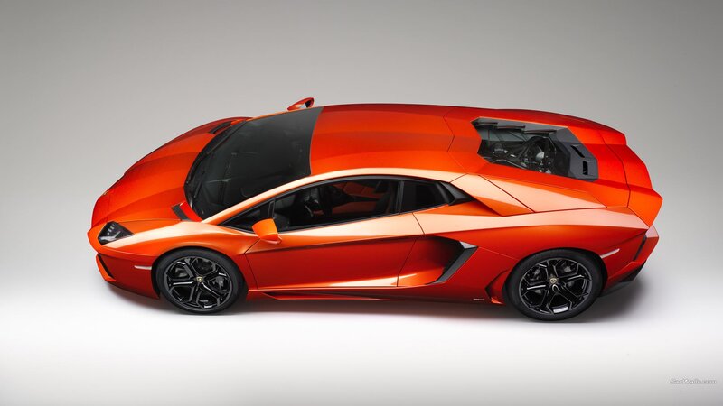 Orange Sports Car — Dramatic, Photograph, Windows