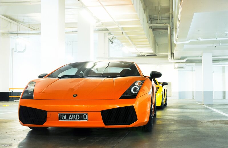 Orange Sports Car — Dramatic, Photograph, Yellow Sports Car, Parking Garage