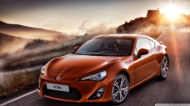 Orange Sports Car — Dramatic, Sunrise