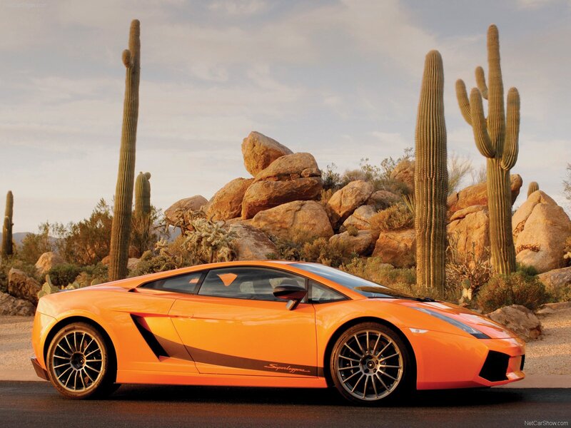 Orange Sports Car — Dramatic, Sunset, Photograph, Cactus, Rock Formation, Desert