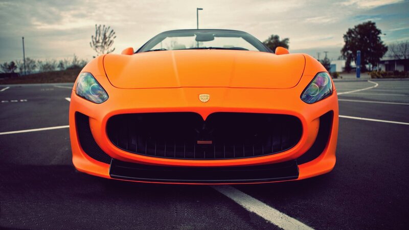 Orange Sports Car — Dramatic, Sunset, Photograph, Parking Lot, Sky