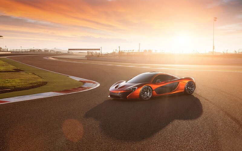 Orange Sports Car — Dramatic, Sunset, Photograph, Race Track, Grass, Black
