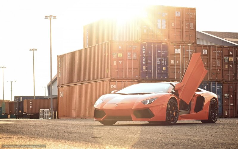 Orange Sports Car — Dramatic, Sunset, Photograph, Shipping Containers