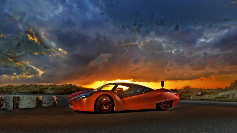 Orange Sports Car — Dramatic, Sunset, Photograph, Sky