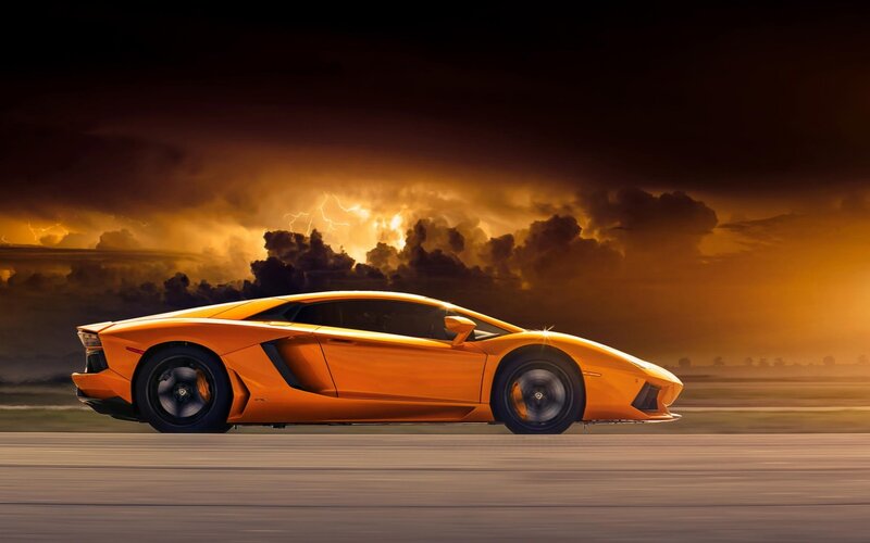 Orange Sports Car — Dramatic, Sunset, Photograph, Storm