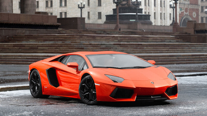 Orange Sports Car — Dramatic, Winter, Photograph, Steps