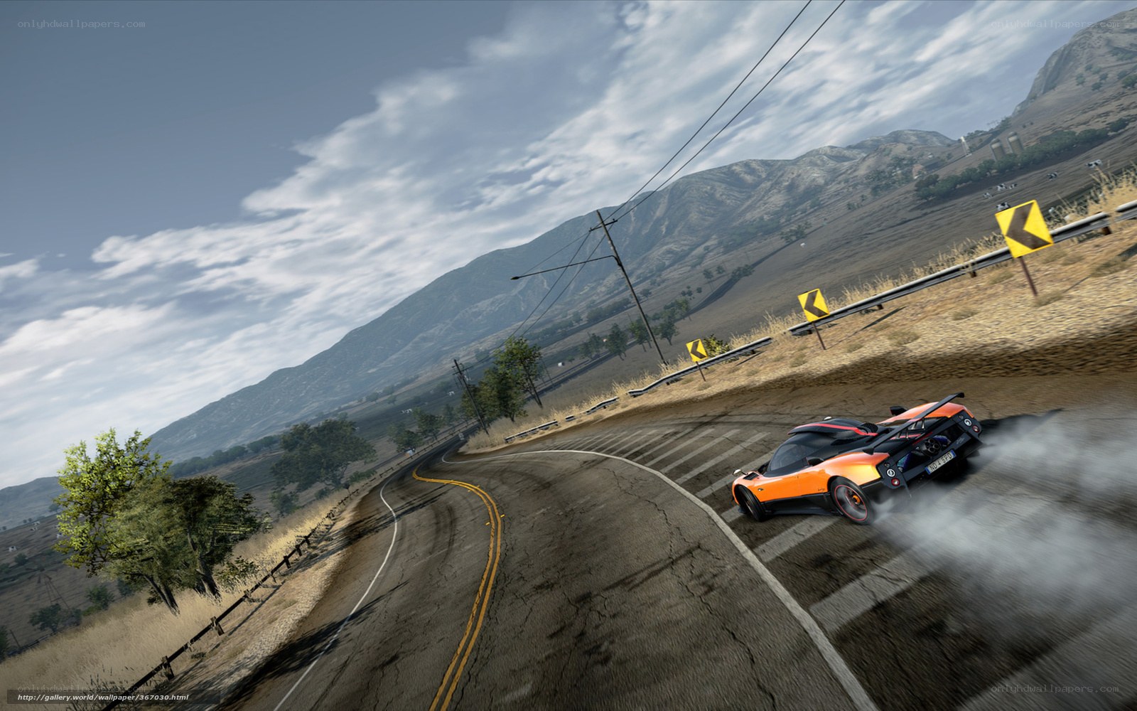 orange sports car drifting