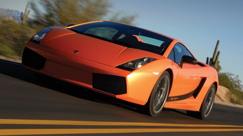 Orange Sports Car — Dynamic, Afternoon, Photograph, Cactus, Road