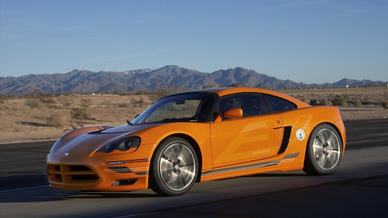Orange Sports Car — Dynamic, Afternoon, Photograph, Desert, Mountains