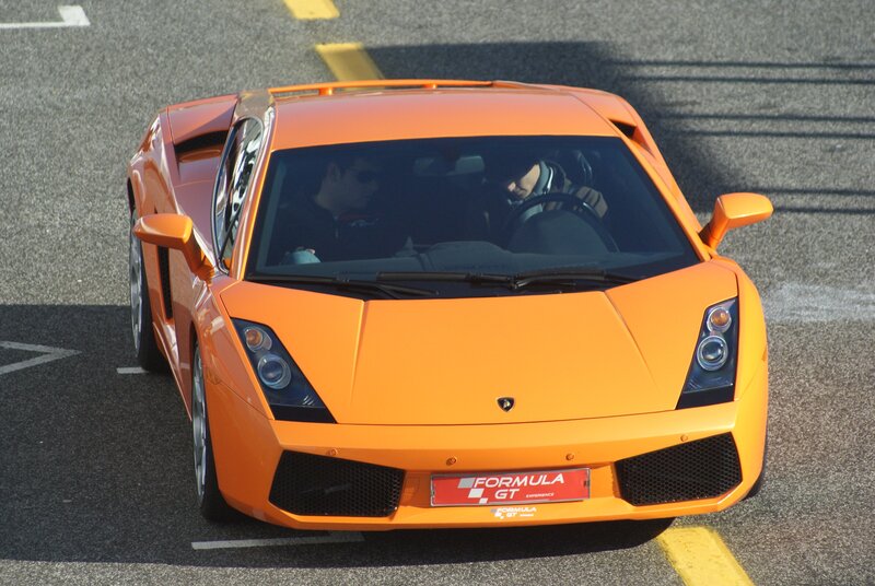 Orange Sports Car — Dynamic, Afternoon, Photograph, People