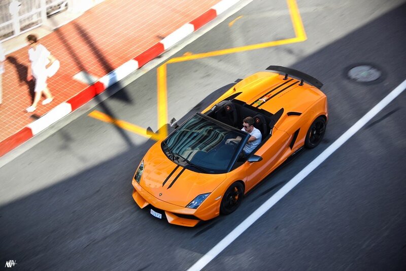 Orange Sports Car — Dynamic, Afternoon, Photograph, Person