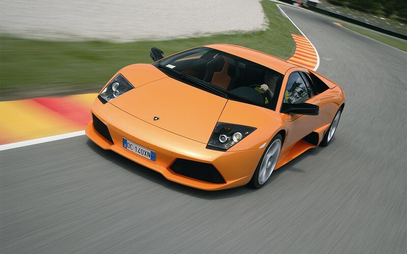Orange Sports Car — Dynamic, Afternoon, Photograph, Race Track, Driver