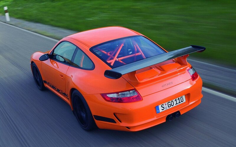 Orange Sports Car — Dynamic, Afternoon, Photograph, Road, Grass