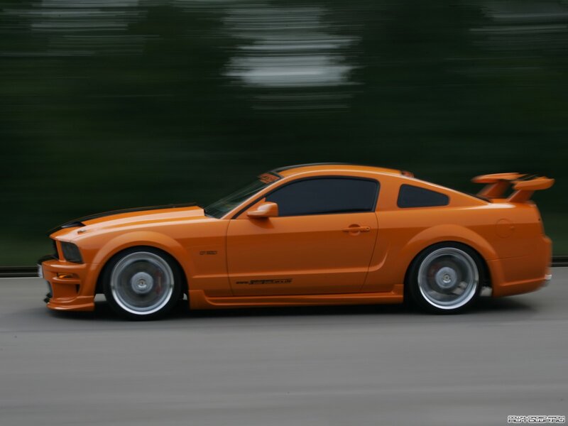 Orange Sports Car — Dynamic, Photograph, Tire, Windshield