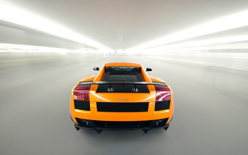 Orange Sports Car — Dynamic, Photograph, Tunnel, Taillights