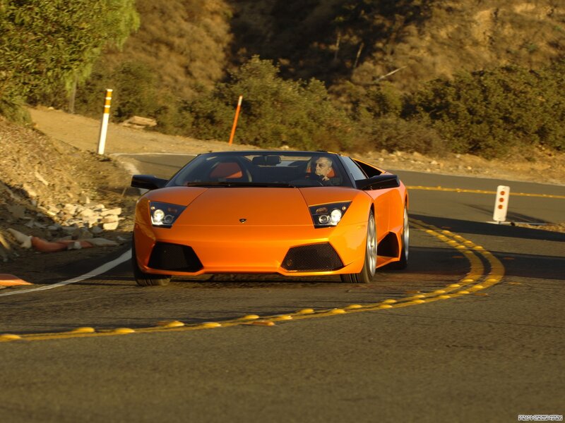 Orange Sports Car — Dynamic, Sunset, Photograph, Driver, Road, Hills, Black