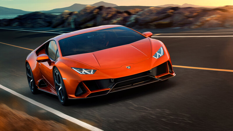 Orange Sports Car — Dynamic, Sunset, Photograph, Road, Mountains