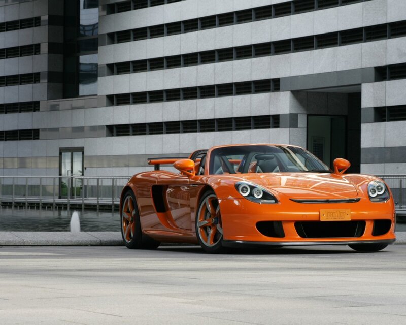 Orange sports car in city