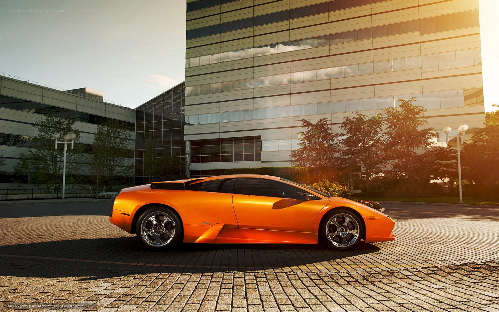 Orange sports car in city