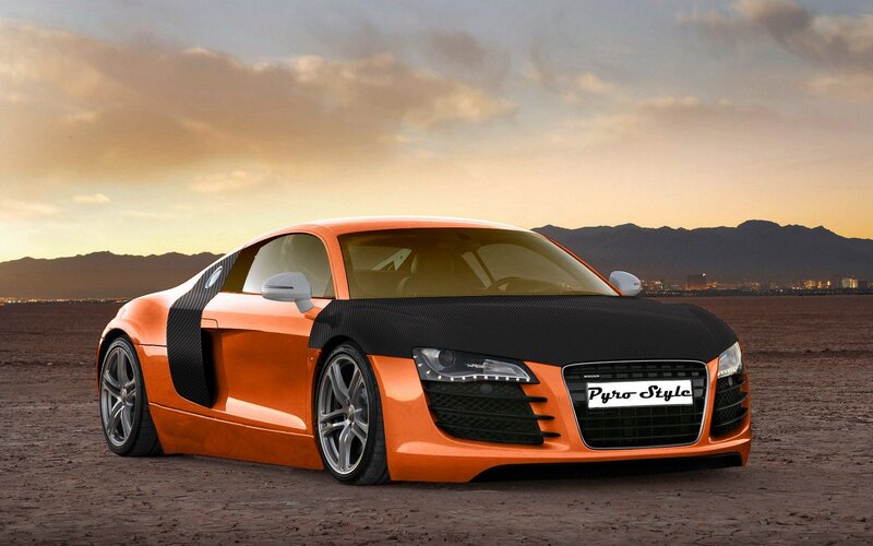 Orange sports car in desert
