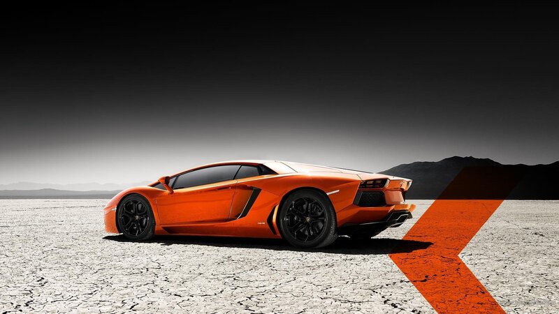 orange sports car in desert