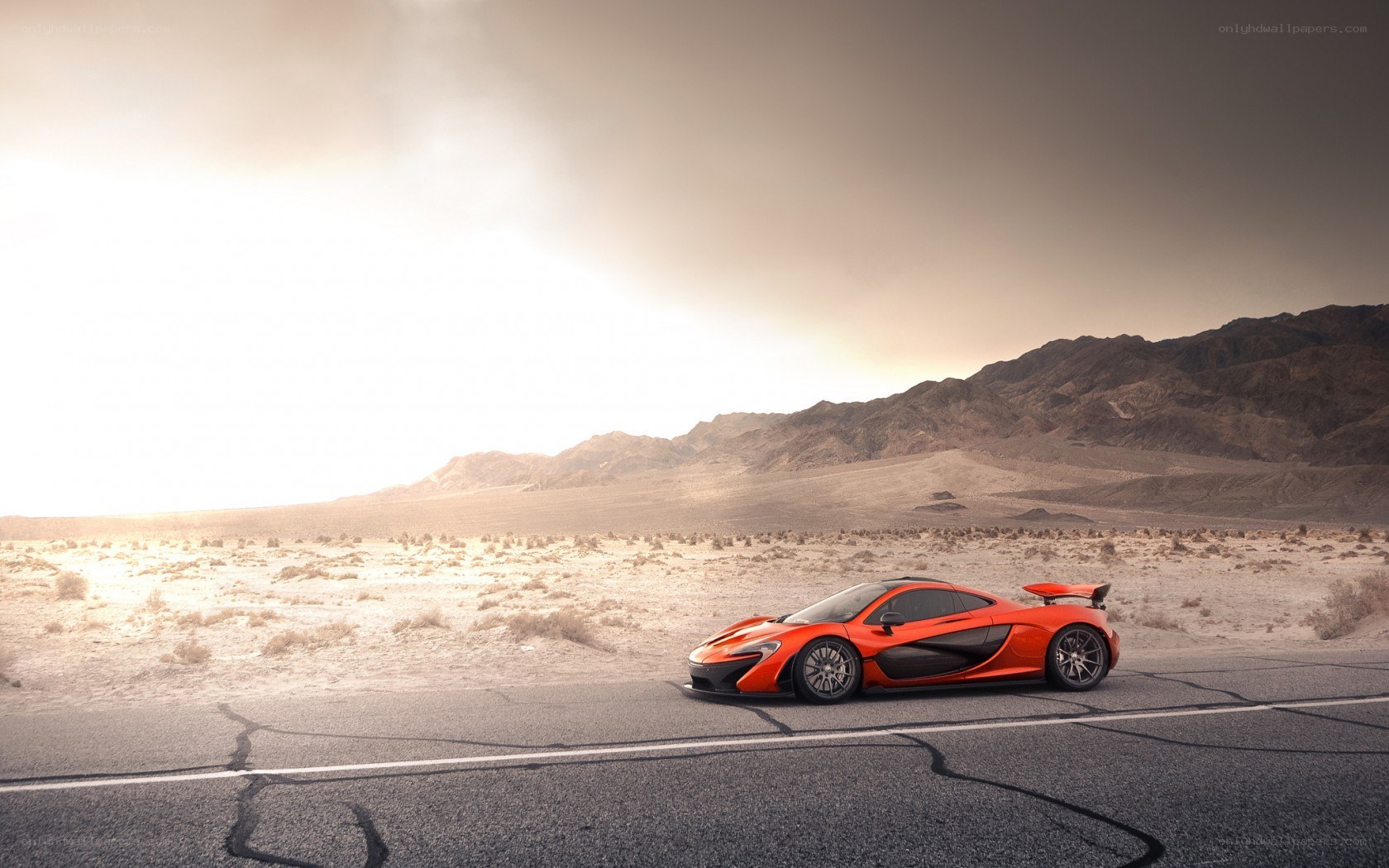 orange sports car in desert