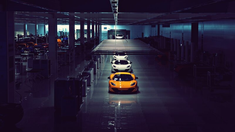 Orange Sports Car in Factory