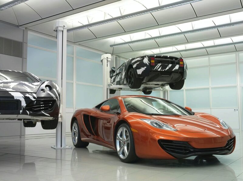 Orange sports car in garage