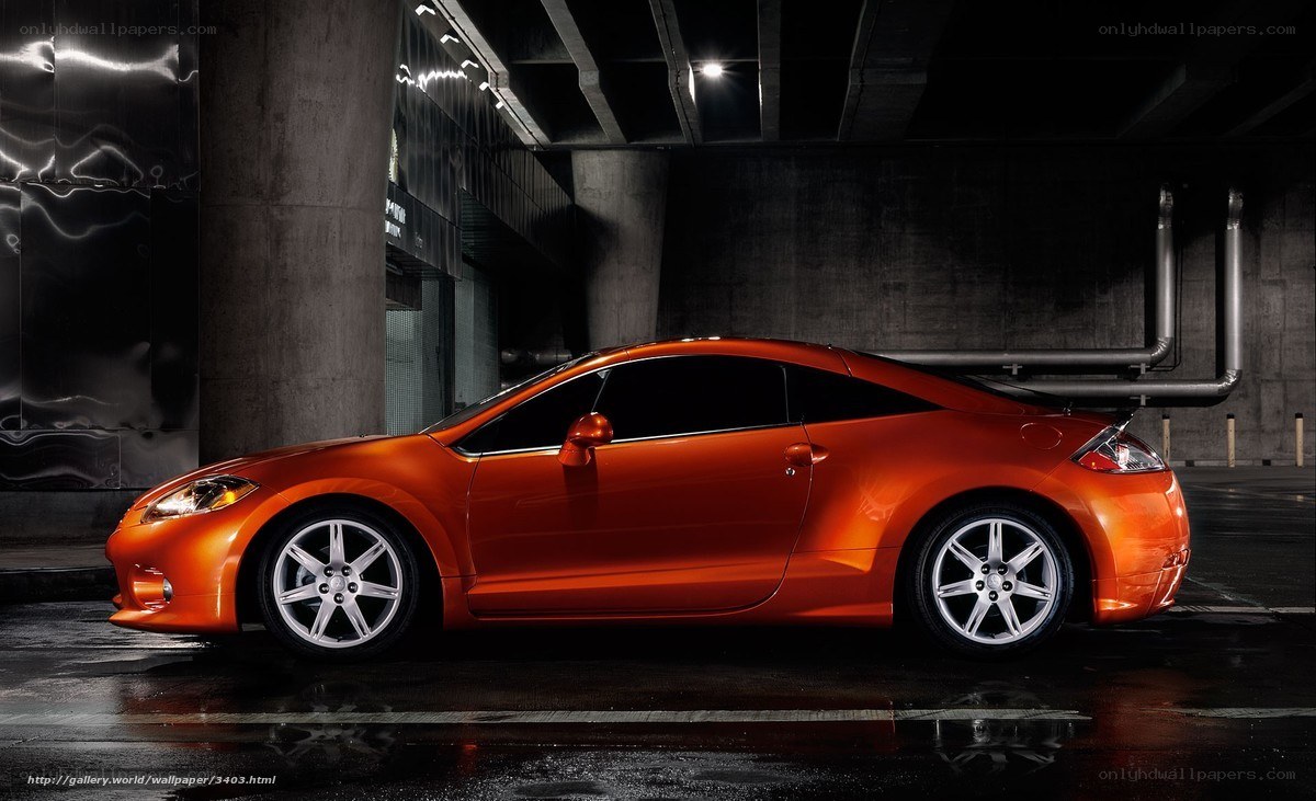 Orange sports car in garage