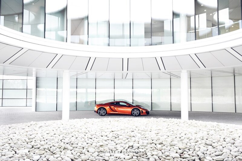 Orange sports car in modern building