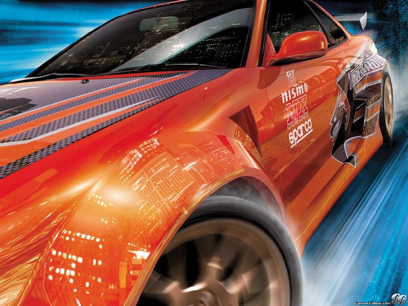 orange sports car in motion