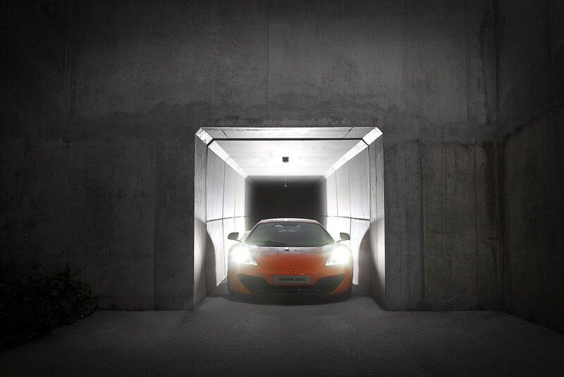 Orange sports car in tunnel