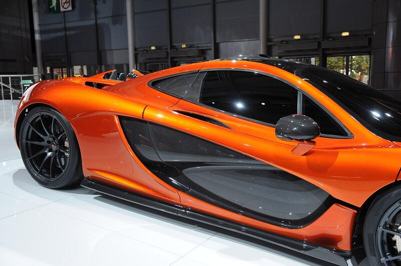 Orange Sports Car — Modern, Photograph, Showroom