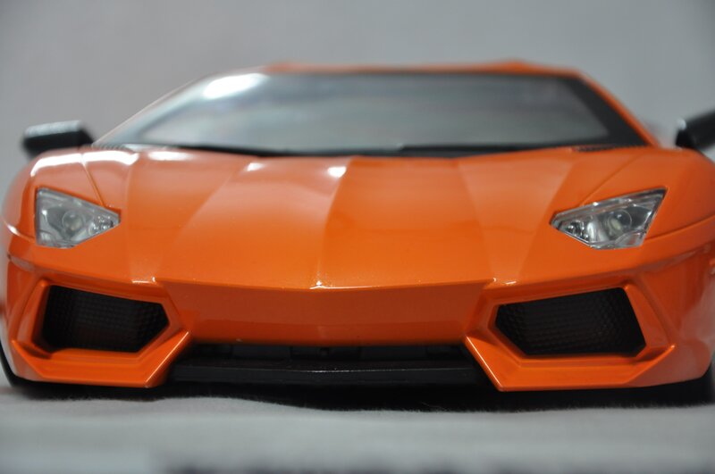 Orange Sports Car — Neutral, Photograph, Headlights, Grille