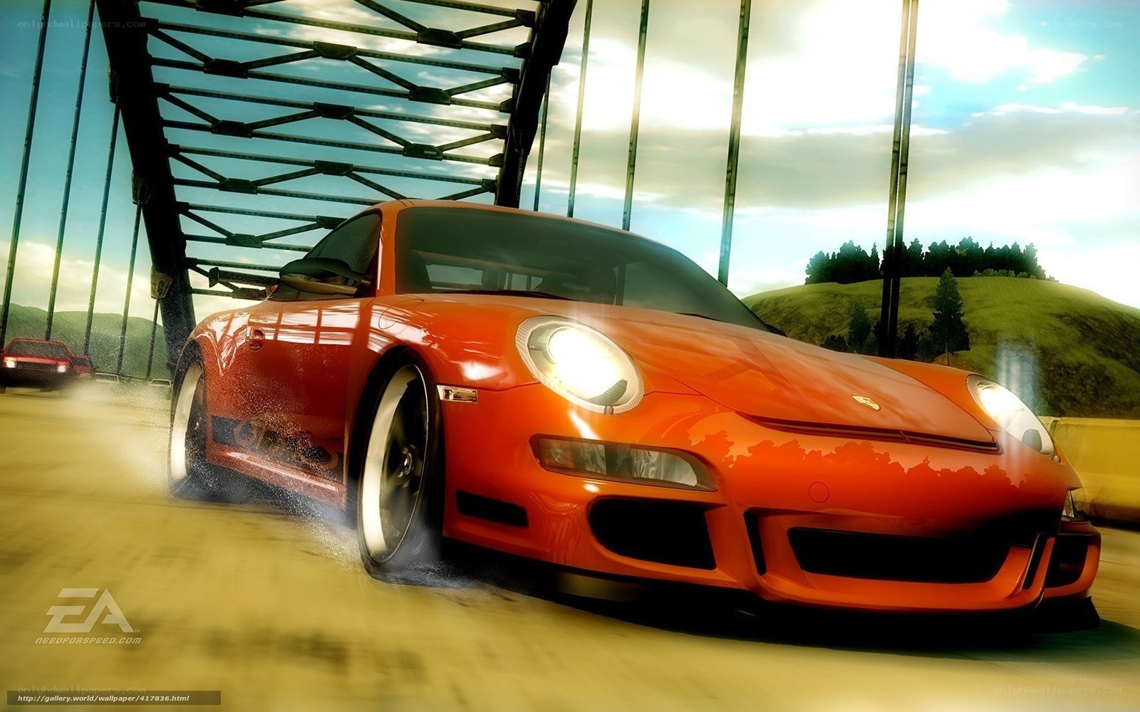 Orange sports car on a bridge