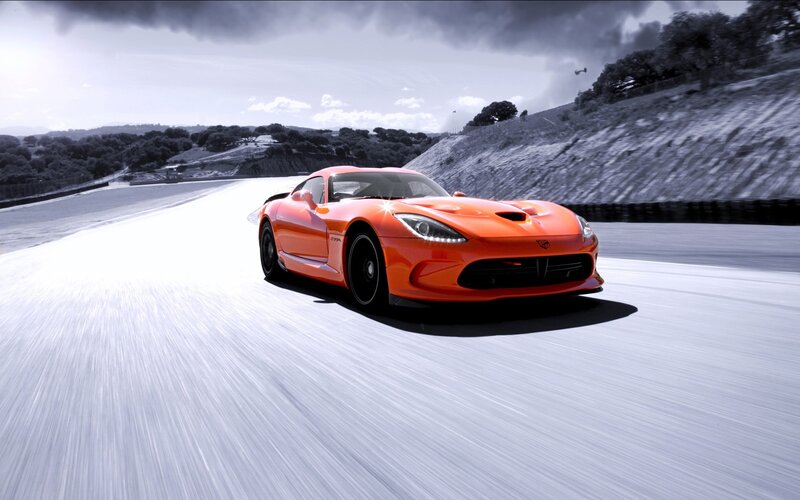 Orange sports car on a racetrack