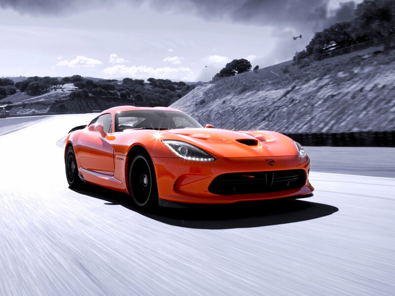 Orange sports car on a racetrack